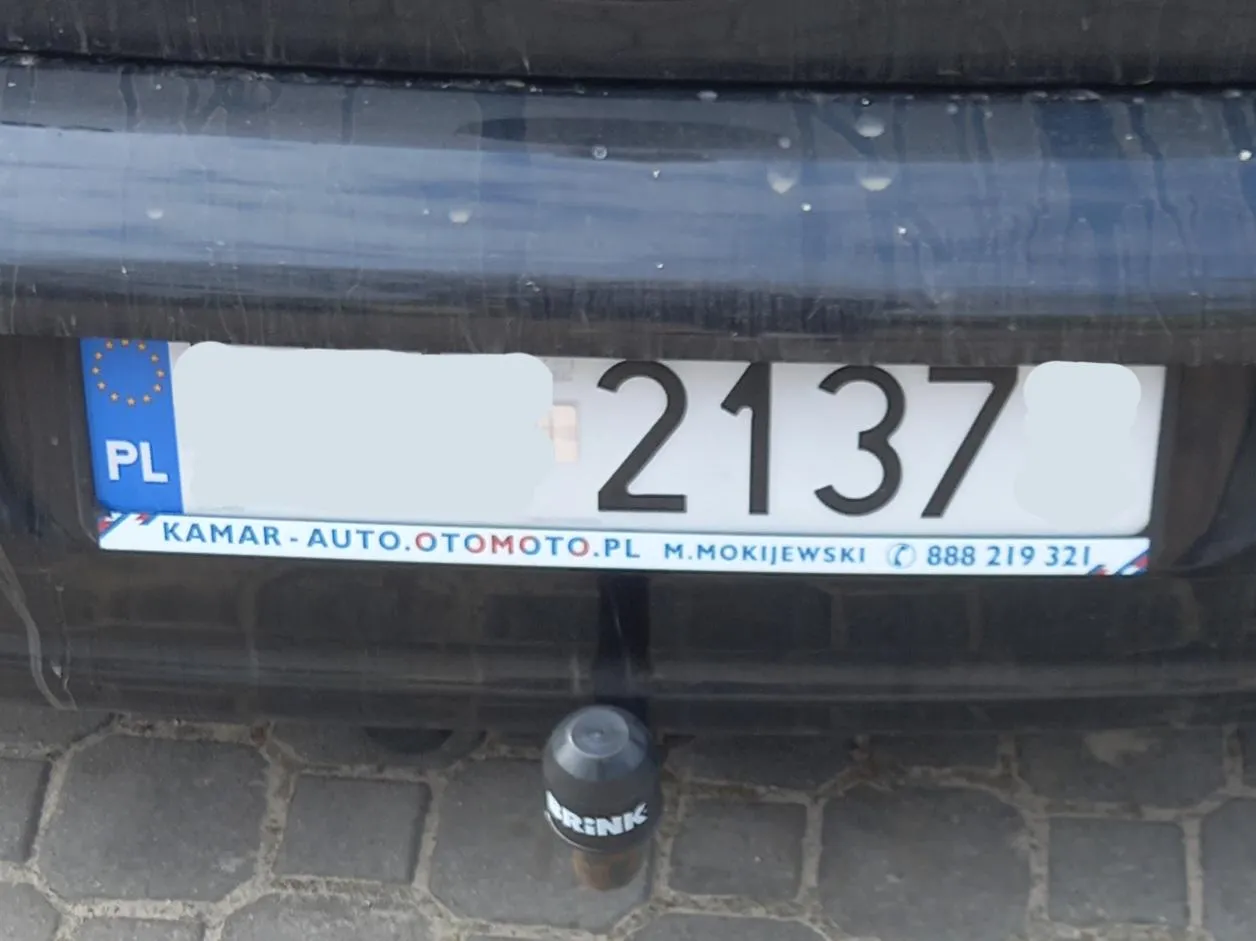 Jan Paweł święty w tablicy rejestracyjnej zaklęty